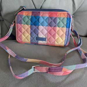From Vera Bradley, the Quilted Tropics Plaid RFID All in One Crossbody